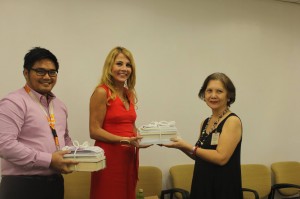 Patsy Doerr presented the books to Ardis Gonzales during a turnover ceremony